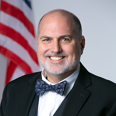 Headshot of Executive Director C. Joshua Villines.